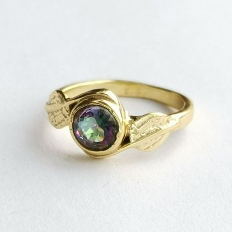 Mystic Topaz Fancy Round Cut Ring In Leaf Design In 14k Gold Fill Over Sterling Silver Stamped 925 Size 6 Mystic Topaz In This Ring Appears In Purple To Green Tones. Generally, The More Facets The Stone Has, The More Colours It Displays, And For That Reason The Fancy Cuts Are Often Used. Here The Topaz Is Round Cut, With Nice Reflections. I Have Attempted To Take Pictures From Several Angles To Best Display This Feature. Round Cut Ring, Big Stone Ring, Mystic Topaz Ring, Smoky Quartz Ring, Cz Rings Engagement, Turquoise Ring Silver, Silver Wedding Rings, Mystic Topaz, Domed Ring