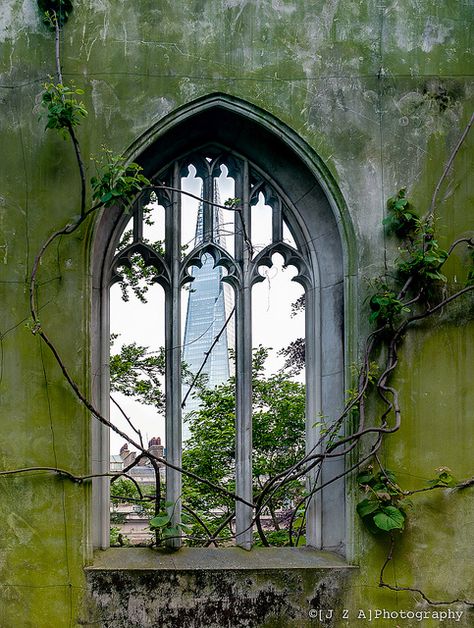 Looking through an old abandoned church window to The Shard in London, England classified as the tallest building in Europe. Photo: JZA Photography. Looking Through Photography, Looking Through, Gothic Church Window, Gothic Window, Old Window Frames, Window Photography, Church Window, Gothic Windows, Abandoned Church