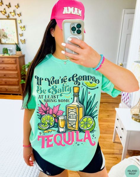 🌞🍹🌊 Unleash your summer vibes with our *Salty & Sassy Tequila Tee*! Perfect for those who love a splash of fun and a dash of sass. Whether you're hitting the beach or chilling by the pool, this tee is your ultimate summer companion. Grab yours now at Oopsie Daisy and make every moment a fiesta! 🌴✨ #oopsiedaisy #summerstyle #tequilatees #staysalty #sassy #summervibes #summer #sunshine #tequila #cute #tshirts #fashion Oopsie Daisy, Stay Salty, Summer Sunshine, Blue Lagoon, Cute Tshirts, The Pool, Tequila, Favorite Jeans, Beach Day