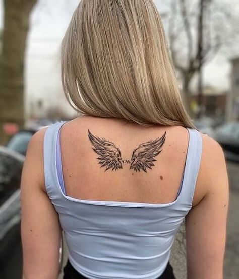 222 With Angel Wings Tattoo, Wing Tattoo Women Back, Wings Tattoo Back Woman, Cross With Wings Tattoo For Women, Angle Wing Tattoo On Back, Angel Wing Back Tattoo Women, Angel Wings Tattoo On Back Women, Wings Tattoo Women, Angel Wings Tattoo Ribs