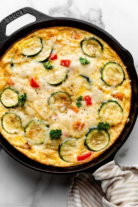 This easy vegetable frittata recipe will be your new go-to for a healthy egg-based dish you can serve and enjoy any time of day. Use zucchini, peppers, sweet potato, and red onion for a veggie-filled oven-baked meal. Recipe on sallysbakingaddiction.com Frittata Recipes Breakfast, Vegetable Frittata Recipes, Tomato Frittata, Easy Frittata Recipe, Easy Frittata, Breakfast Frittata, Vegetable Frittata, Zucchini Tomato, Healthy Eggs