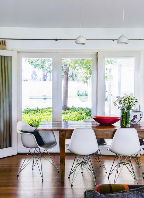 A light filled dining room with polished wood floors, timber table and eames Eiffel chairs is the heart of this country homestead. Photography: Maree Homer | Styling: Kate Nixon | Story: Australian House & Garden Eiffel Chair Dining Room, White Eames Chair, Country Homestead, Eames Dining, Eiffel Chair, Australian House, Elegant Farmhouse, Farmhouse Table Chairs, Have The Best Day