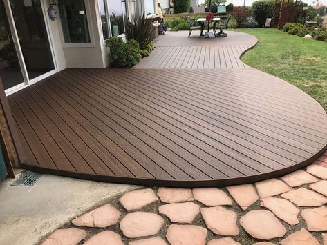 Trex Spiced Rum Curved deck. #DestinationTrexSweeps | Curved patio, Decks backyard, Patio design Trex Spiced Rum, Curved Deck, Curved Patio, Floating Deck, Patio Deck Designs, Wooden Deck, Star Decor, Deck Designs Backyard, Backyard Inspiration