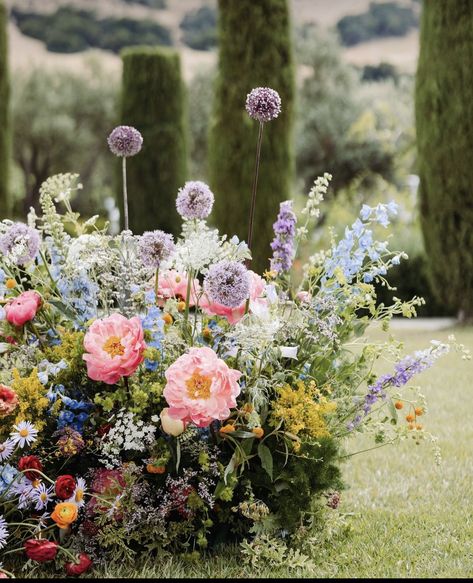 Grounded Floral Arrangement, Wildflower Floor Arrangement, Ground Ceremony Flowers, Floor Floral Arrangements Wedding, Ground Floral Arrangements Wedding, Wildflower Table Setting, Ceremony Flowers Altar, Whimsical Flower Arrangements, Whimsical Floral Arrangements