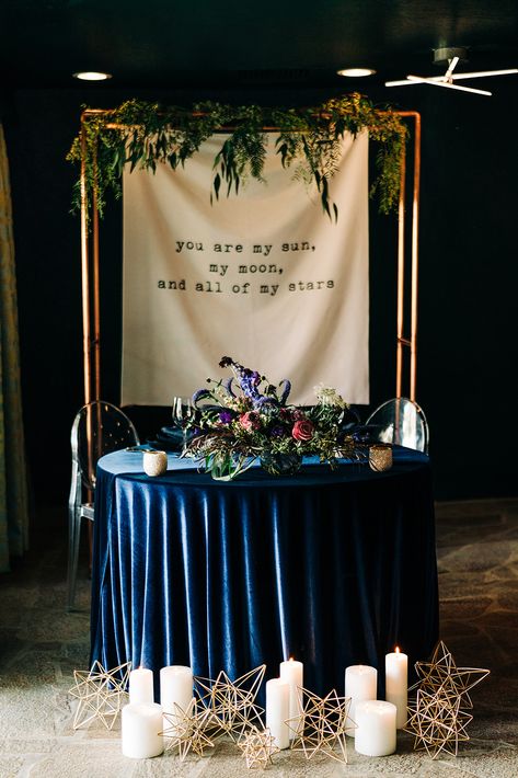 Dark and Moody Celestial Wedding Inspiration via Rocky Mountain Bride Constellation Wedding Decor, Celestial Wedding Sweetheart Table, Celestial Woodland Wedding, Moon Decor Wedding, Celestial Wedding Aisle, Celestial Wedding Signage, Celestial Wedding Backdrop, Start Night Wedding, Starry Night Wedding Flowers