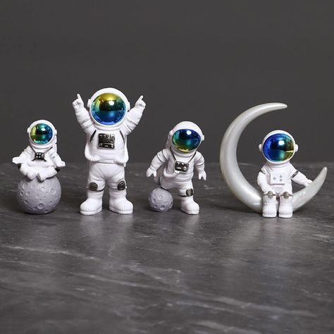 PRICES MAY VARY. 【Astronaut Toy】Kids are interested in outer space and dream of becoming an astronaut! The mini astronaut statue will attract kid's attention, stimulate their creativity and imagination to explore and learn more about the planets 【Premium Materials】LUOZZY Astronaut Cake Topper is made of high quality PVC solid plastic with excellent craftsmanship and three-dimensionality. Vivid and adorable, perfect for space birthday cake decorations 【Astronaut Figurines】Bring the wonder of oute Space Theme Party Decorations, Space Cake Topper, Mini Astronaut, Astronaut Cake, Space Theme Party, Outer Space Theme, Space Birthday Party, Space Baby, Boy Decor