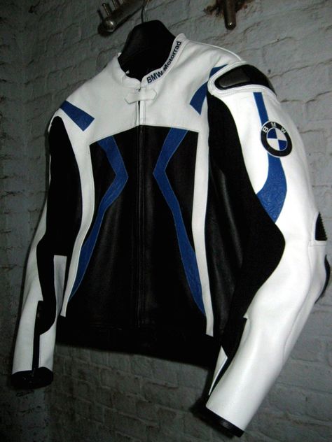 BMW MEN Motorbike Racing Leathers jacket is especially designed for professional bikers to fulfill their biking passion on track with great safety. This Jacket features excellent design & comfort, 100% genuine Cowhide leather, approved internal & external Protectors on Shoulder, Elbows and Back, YKK Zippers for Performance. Full ventilated Chest to keep the biker cool while riding (Optional). Available in all sizes, XS,S,M,L,XL,XXL,XXXL & Custom Size. Safety Features: *External CE Approved prote Motorcycle Clothes Men, Race Outfits Men, Racing Jacket Outfit Men, Blue Racer Jacket, Motorcycle Outfits For Women, Bmw Jacket, Blue Biker Jacket, Racing Jacket Outfit, Bmw Motorbike