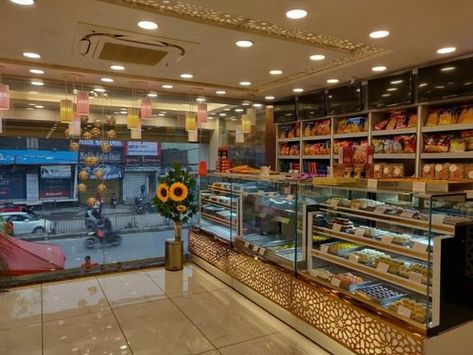 Indian Bakery Shop Design, Sweet Shop Interior Design Indian, Sweet Shop Interior Design, Sweet Shop Interior, Indian Sweet Shop, Cash Counter Design, Confectionery Shop, Bakery Shop Interior, Bistro Interior