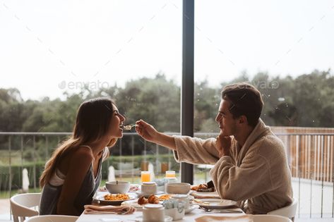 Couple eating breakfast together by TrendsetterImages. Romantic couple eating breakfast together at the hotel #Sponsored #breakfast, #eating, #Couple, #TrendsetterImages Breakfast Together Couple, Couple Making Breakfast, Couples Eating Together, Couple Eating Together Aesthetic, Romantic Morning Couple Breakfast, Couples Making Breakfast, Couple Eating Together, Couple Eating Breakfast, Couples Breakfast