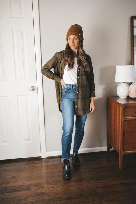 ashley wearing a green and black plaid flannel unbuttoned with a white tank, mid-wash mom jeans, and black lug sole chelsea boots with a brown beanie Outfits With Black Chelsea Boots, Black Lug Boots Outfit, Dress With Chelsea Boots, Ways To Style A Flannel, Brown Chelsea Boots Outfit, Chelsea Boots With Jeans, Styling A Flannel, Chelsea Boot Outfit, Lug Sole Chelsea Boots