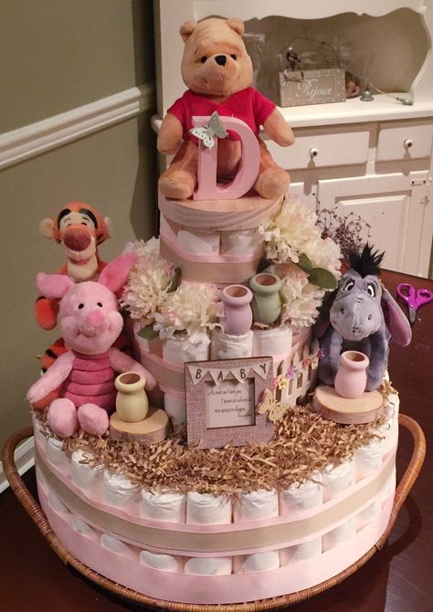 Pooh Bear Diaper Cake, Winnie The Pooh Diaper Cake Ideas, Pooh Bear Baby Shower Ideas Girl, Winnie The Pooh Diaper Cake, Pink Winnie The Pooh Baby Shower Ideas, Disney Diaper Cake, Pamper Cake, Pink Baby Shower Decorations, Bear Baby Shower Theme