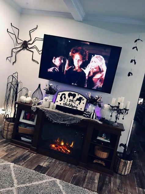 Under Tv Halloween Decor, Halloween Decor For Tv Stand, Halloween Indoor Decorations Living Room, Halloween Decor Entertainment Center, Tv Console Halloween Decor, Tv Stand Halloween Decor Ideas, Halloween Entertainment Center, Halloween Decor Tv Stand, Halloween Fireplace Decor With Tv