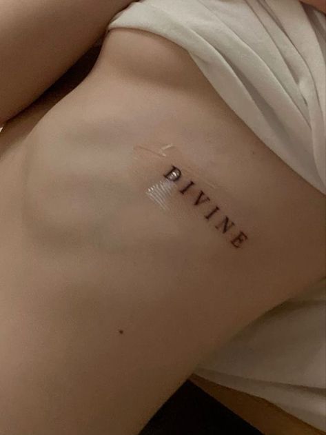 Divine Tattoo, Rib Tattoos Words, Small Rib Tattoos, Tattooed Woman, Rib Tattoos For Women, Ribcage Tattoo, Petite Tattoos, Discreet Tattoos, Dainty Tattoos