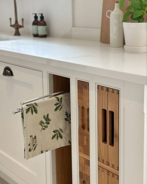 Danielle on Instagram: "Kitchen storage  When designing the kitchen, I wanted to keep it as clutter-free as possible. So, hidden storage was the answer! Here’s a few stills of my favourites. I’ve listed details below and in my stories.  Kitchen by @samuelnealkitchens painted in @littlegreenepaintcompany Slaked Lime Mid and includes built-in oak trays, chopping boards, towel rail, baking and breakfast cupboard.  Baking cupboard with sage green storage jars by @marksandspencer  Wooden spice drawer insert by @amazonuk (linked in my kitchen highlight)  Ad| Kitchen handles: @hendelandhendel Use code DANIELLE10 for 10% discount   #kitchen #kitchendesign #countrykitchen #countryhome #homeaccount #homeinterior #homeinspo #countryhome #countryhouse #hyggehome" Chopping Board Storage, Baking Cupboard, Home Ac, Spice Drawer, Drawer Inserts, Hygge Home, Clutter Free, Hidden Storage, Towel Rail