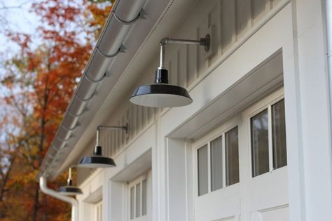 Barn Lighting Offers Authentic Feel in Modern Farmhouse | Blog | BarnLightElectric.com Garage Lights Exterior, Exterior Barn Lights, Garage Light Fixtures, Farmhouse Outdoor Lighting, Modern Farmhouse Light Fixtures, Modern Farmhouse Porch, Farmhouse Dining Room Lighting, Modern Farmhouse Lighting, Barn Light Electric