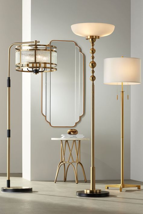 Vivant Chairside Arc Lamp Warm Gold- 294x1: warm gold with matte black accents and frosted glass shade. Summit Light Blaster™ Torchiere Floor Lamp- 255h2: great for ambient light as well as reading, crafts and other tasks. Finished in warm gold with a contrasting black matte base. Encino Antique Brass Modern Tripod Floor Lamp- 33d09: antique brass finish with fabric drum shade. Symphony Brush Gold 23 1/2" x 47" Scalloped Edge Wall Mirror. Osso 20" Wide Gold Mosaic Bone Accent Table Gatsby Floor Lamp, Art Deco Floor Standing Lamp, Classic Lamp Design, Glam Floor Lamp, Art Deco Lamps Vintage, Art Deco Floor Lamps, Art Deco Standing Lamp, Tall Gold Lamp, Black And Gold Floor Lamp