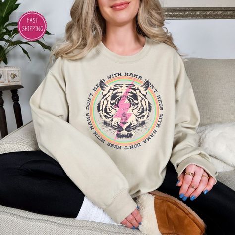 👀🐅 Get ready to ROAR this Mother's Day with our Retro Tiger Sweatshirt! 🎁💕 Show your fierce love for mama with our 'Don't Mess With Mama' design. 😎👩‍👧‍👦 This comfy and stylish sweatshirt is the perfect gift for all the amazing moms out there. 💪🏼😍 Hurry and grab yours for only $22.28! 🔥🛍️ #MothersDay #GiftFor Shop Now https://www.etsy.com/listing/1708020065/retro-tiger-sweatshirt-mothers-day-gift Mama Design, Get Ready, The Amazing, Mother’s Day, Mother's Day Gifts, Mother's Day, Mothers Day, Shop Now, Perfect Gift