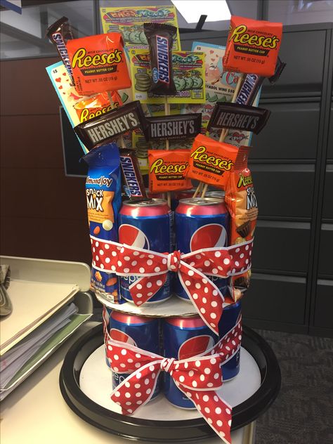 Soda can cake with candy and lottery tickets! Soda Can Cake, Fathers Day Gifts Ideas Lottery Tickets, Lottery Ticket Gift Ideas 18th Birthday, Scratcher Bouquet Lottery Tickets, Soda Bottle Candy Bouquet Diy, Soda Can Cakes, Soda Can Cake Tower Diy Birthday Gifts, Retirement Party Favors, Soda Cake