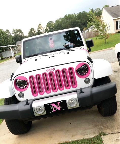 Pink Jeep Wrangler Unlimited Sahara White Jeep Pink Accents White Jeep Wrangler Pink Accessories, Pink And White Jeep Wrangler, Black Jeep Pink Accents, White Car With Pink Accents, Pink Keep Wrangler, Pink Jeep Wrangler Aesthetic, White Jeep Pink Interior, Car With Pink Accents, White Jeep Pink Accents