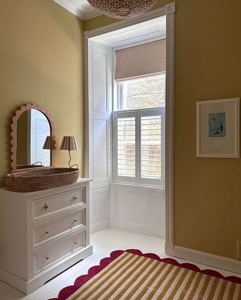 Farrow & Ball Hay No.37 is a dusty, modest yellow that has a distinctly green undertone which gives it an established feel, creating peaceful spaces. We think it fulfilled its obligation in this lovely nursery, don’t you? Walls and wardrobe painted in Hay Dead Flat. 📸: @joannalari Repost: @farrowandball Sample pots available at Hirshfield’s Edina and Roseville locations. Yellow Nursery Walls, Sacred Room, Yellow Lamp, Yellow Nursery, Door Hook, Cot Mobile, Nursery Room Design, Making Decisions, Yellow Bedroom