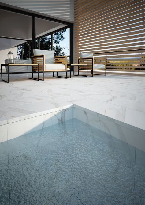 Today we bring you a different design option for your terrace or porche. If you love marble effect ceramic tiles more than stones, our #Calacatta series is perfect! Pool Deck Tile, Marble Pool, Skimmer Pool, Terrace Tiles, Moderne Pools, House Pool, Pool Skimmer, Swimming Pool Tiles, Swimming Pool House