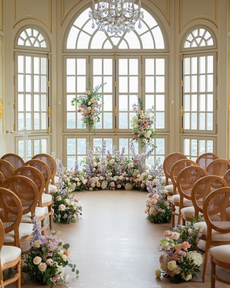 Emilie Hayotte French Wedding Floral Designer on Instagram: "Ceremony of S&J Pink,peach,purple floral design  A beautiful and lovely moment in the luxurious  @chateausaintgeorges   Wedding Planner : @dayloveevent  Venue : @chateausaintgeorges  Photographer : @cesarem.photography  Floral design : @lablondeetlebarbudesign Rentals : @jolibazaar  Officiant : @damouretdencre   #weddingceremony #interiorceremony #2022wedding #chateausaintgeorges #floraldesigners #weddingarch #bridgertonwedding #luxurywedding" Ceremony Flowers Aisle, Ceremony Backdrop Outdoor, Bridgerton Wedding, Dream Wedding Decorations, Aisle Flowers, Wedding Ceremony Flowers, Garden Party Wedding, Peach Wedding, Ceremony Flowers