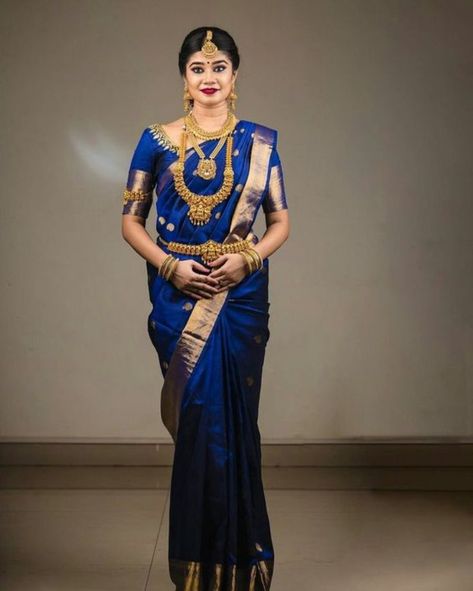 Blue Silk Saree Look Traditional, South Indian Bride Blue Saree, Blue Wedding Saree Bridal Kerala, Dark Blue Silk Saree, Blue Bridal Saree, Cousin Wedding, Kerala Jewellery, Engagement Event, Green Blouse Designs