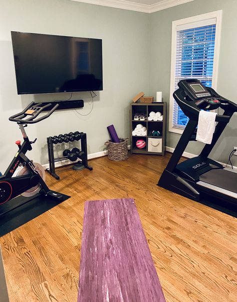 Loft Workout Room, Workout Room Tv, Home Gym Ideas Small Bedroom With Carpet, Cycling Room At Home, Workout Rooms At Home, Home Gym Tv, Girly Home Gym, Exercise Room Ideas Home, Peloton Workout Room