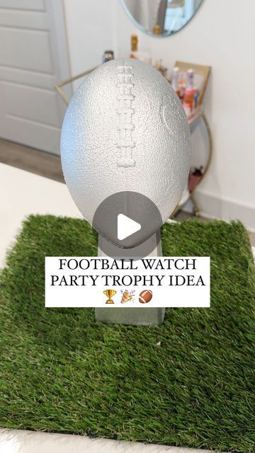 Shelby | Gift-in-a-Box Guide on Instagram: "We love a functional trophy (or hostess gift)  Predict the score and we’ll see if you’re right 😉🏈  #makeitwithmichaels #biggame #partyfavors #footballparty #michaelsstores #footballwatchparty #diy #howto #michaels #makeitwithmichaels #hostingideas #gameday #partyideas #easydiy #footballparty #diypartydecor #diyideas" Football Trophy Diy, Superbowl Party Table Decor, Diy Super Bowl Trophy, Super Bowl Party Centerpieces, Diy Football Party Favors, Diy Football Trophy, Football Party Centerpieces Diy, Trophy Centerpiece Ideas, Football Party Ideas Food