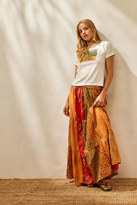 Bring bohemian energy in this patchwork style maxi skirt by Archive At UO. The overdyed skirt features a stretchy waistband with a drawstring fastening and a flowy maxi hem that drops to the floor. Patchwork Maxi Skirt Outfit, Orange Maxi Skirt Outfit, Patchwork Skirt Outfit, Soul Outfit, Maxi Skirt Hippie, Orange Maxi Skirt, Patchwork Maxi Skirt, Style Maxi Skirt, Lily Calloway