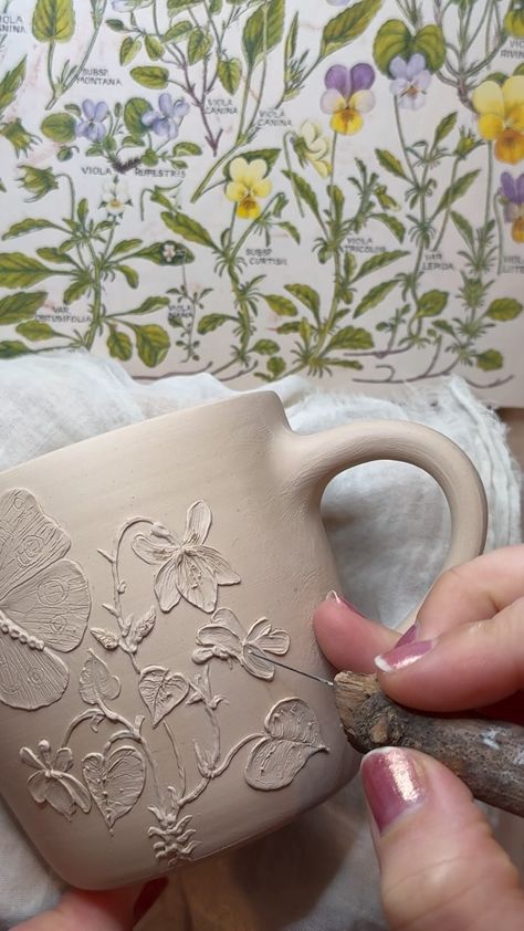 Painting clay slip on a dandelion vase waiting for a snow storm 🌨️ ✨ #handmadepottery #pottery #ceramics #handmade #handmadeceramics… | Instagram Pottery Ideas Gift, Slip Painting Pottery, Handmade Pottery Ideas Inspiration, Clay Slip, Ceramic Slip Design, Slip Pottery, Slip Design Ceramics, Ceramic Drawing, Hand Built Mugs Clay Pottery Ideas