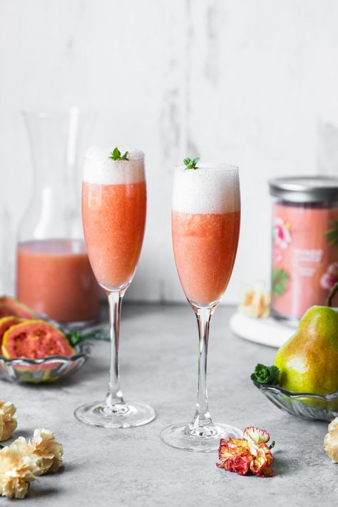 This delicious tropical mimosa features guava with a hint of pear, naturally sweetened with honey and topped with a fruity and beautifully bubbly sparkling rosé! Pear Mimosa, Tropical Mimosa, Pear Cocktails, Prosecco Wine, Fruit Combinations, Guava Fruit, Guava Juice, Mimosa Recipe, Homemade Juice