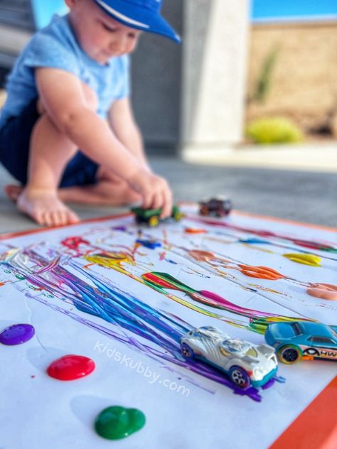 Painting With Cars - Fun Action Art Activity Montessori Car Activities, Cars Activities, Painting With Cars, Action Art, Car Activities, Fine Motor Activities For Kids, Messy Art, Baby Learning Activities, Fine Motor Skills Activities