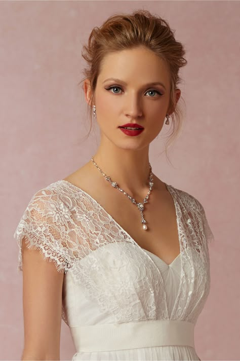 For all the brides that want a little bit of extra coverage on their wedding day, we suggest an elegant cover up. Many brides wear cover ups for various reasons. Some wear the cover up to add some flare to a simple gown, simply not to show as much skin, coverage in cooler weather, or … Wedding Gown Cover Up, Dress Coverup Ideas, Wedding Dress Cover Up, Wedding Dress Cover, Annabelle Dress, Silver Cocktail Dress, Mrs Hudson, Bridal Cover Up, Wedding Dresses Strapless