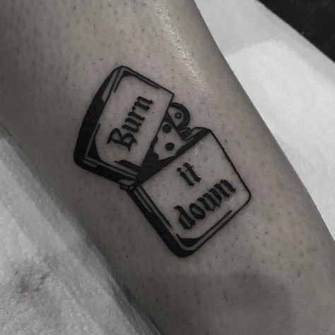 Zippo lighter and words ‘burn it down’ tattoo inked in black and white colors. Lighter Tattoo, Tato Minimal, Light Tattoo, Burn It Down, Black Tattoo, White Patches, Tattoo Outline, Zippo Lighter, White Tattoo