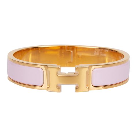 Hermes narrow Clic Clac H bracelet in Rose Dragee enamel with gold plated hardware in size PM. Origin: France Condition: Pristine; new or never Accompanied by: Hermes box, Hermes dustbag, carebook and ribbon Measurements: Diameter: 2.25"; Circumference: 7.5"; Width: .5" H Bracelet, Hermes Bracelet, Hermes Jewelry, Hermes Box, Gold Ounce, Enamel Bracelet, Pink Bracelet, Dust Bag, Fendi