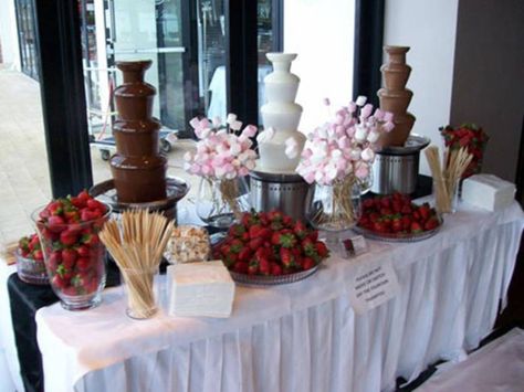 Chocolate Fountain Buffet, Fondue Wedding Bar, Chocolate Fountain Wedding Display, Chocolate Fountain Bar Ideas Wedding, Chocolate Fountain Display Ideas, Wedding Chocolate Fountain Display, Pink Chocolate Fountain Bar, Chocolate Fountain Wedding Ideas, Chocolate Fountain For Wedding