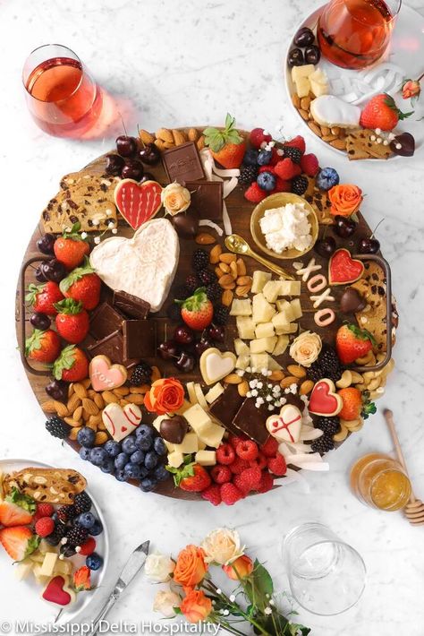 This Chocolate and Cheese Dessert Board is the absolute best! Dark chocolate, homemade sugar cookies, nuts, fresh berries, + cheeses. What could be better?! Perfect for Valentine's Day, anniversaries, date night, parties, get togethers, or even just as a little treat for yourself. There is no wrong way to enjoy this amazing board.I have made a lot of different types of cheese/charcuterie boards in my day. It's a staple dinner around my house, but this one is my hands down favorite!Seri… Best Dark Chocolate, Charcuterie Party, Strawberry Sugar Cookies, Bakers Table, Chocolate Homemade, Cookies Homemade, Homemade Sugar Cookies, Dessert Board, Fruit Cookies