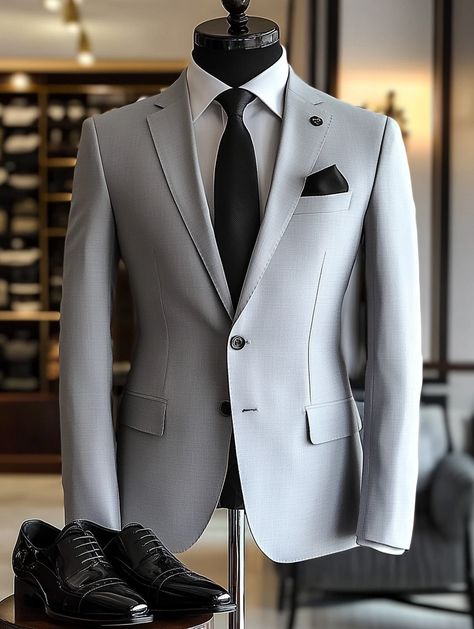 Make a lasting impression with our light gray suit. Visit our website to explore this classic look.   #TimelessStyle #Menswear #mensfashionwear#trustycoders #menstylepage #fashion #mensfashiontips #mensclothing #menaboutfashion #bespokesuit #bespoke #dapper #ootdmenstyle #mensstreetstyle Light Gray Suits For Men Wedding, Light Grey Suits Wedding, Light Grey Suit Men, Light Gray Suits, Masculine Contemporary, Light Gray Suit, Grey Mens Suit, Suit For Men Wedding, Mens Outdoor Fashion