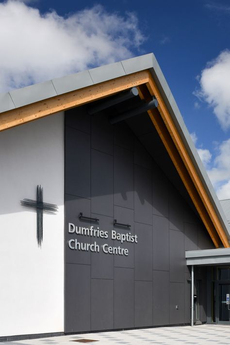 The brief was to create a new purpose built ‘home’ for the established Dumfries Baptist Church; an ambitious new community church building where all are welcome, that serves local people and the church family and is a meeting place for local community groups. The building is a flexible use community hub which comprises worship and conference facilities including full catering services, youth facilities, a full specification games hall and external Multi-Use Games Area. Click to see the project! Church Exterior Design, Modern Church Design, Church Exterior, Church Building Plans, Worship Design, Kids Church Rooms, Church Design Architecture, Church Entrance, Church Building Design