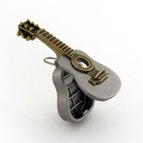 Acoustic Guitar Locket Necklace by tcustom on Etsy https://www.etsy.com/listing/224261681/acoustic-guitar-locket-necklace Guitar Necklace, Guitar Jewelry, Piano Gifts, Folk Guitar, Miniature Guitars, Matching Couple Bracelets, Guitar Pics, Music Jewelry, Steampunk Accessories