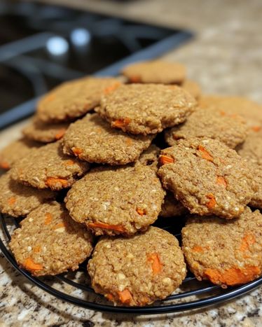 Peanut Butter & Carrot Dog Cookies are easy, healthy, and your dog will love them. Make these treats today! Subscribe for more recipes. Vegetable Dog Treats Homemade, Dog Treats With Carrots, Peanut Butter Carrot Dog Treats, Frozen Carrot Dog Treats, Carrot Dog Treats, Peanut Butter And Carrot Dog Treats, Apple Carrot Dog Treats, Carrots And Peanut Butter, Peanut Butter For Dogs