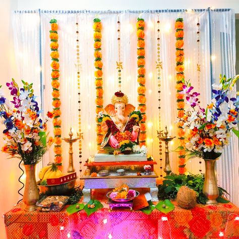 Simple and sweet home decoration idea for ganesh chathurti Ganesh Chaturthi Decoration Ideas For Home, Ganesh Pooja Decoration Ideas At Home Simple, Vinayaka Chaviti Decor, Saree Decoration For Ganpati, Ganesh Chaturthi Home Decoration, Backdrop Ideas For Ganpati Decoration, How To Decorate Mandir At Home, Simple Ganesh Chaturthi Decoration Ideas, Ganpati Bappa Decoration At Home Simple