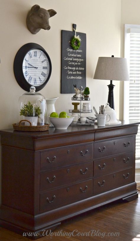 Use a dresser in the kitchen or dining room to store kitchen and table linens.  Make a great space to display favorite pretties too. Buffet Wall, Buffet Styling, Dining Room Buffet Decor, Table Linen Storage, Decoration Buffet, Buffet Table Decor, Farmhouse Buffet, Dining Room Console, Sideboard Decor