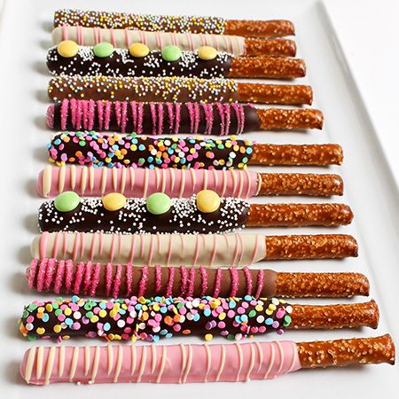 These brightly colored chocolate covered pretzel confections are a yummy indulgence for spring! Pretzel Knots, Chocolate Dipped Pretzel Rods, Yogurt Covered Pretzels, Dipped Pretzel Rods, Christmas Pretzels, Food Planning, Chocolate Covered Pretzel, Chocolate Covered Pretzel Rods, Chocolate Dipped Pretzels