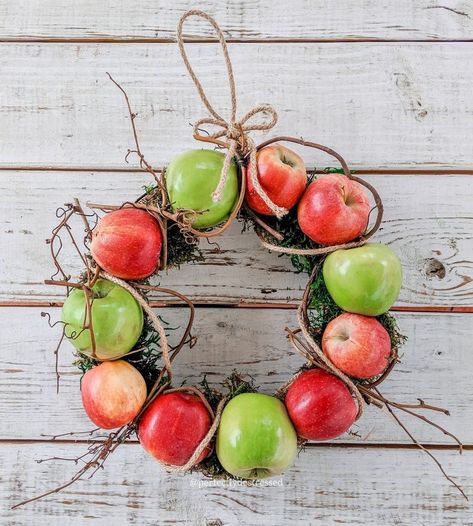 I love projects that are inexpensive to make and help feed our wildlife, too.Plus, this is a great use (other than baking) for those bruised apples you don't want to get rid of but don't know what the heck to do with!I'm always making crap from junk. Follow along with me on IG!   This is a perfect wreath to use on the front door in the autumn. Especially if you're hosting a fall or Thanksgiving dinner. It would be adorable in the kitchen, too.   Apple picking is such a fun fall family… Apple Wreath Diy, Love Projects, Fall Fa, Fall Family Activities, Apple Wreath, Easy Wreaths, Wire Wreath Forms, Diy Back To School, Diy Fall Wreath