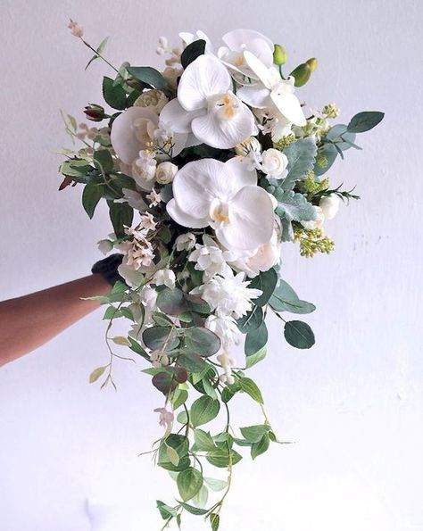 Orchid Eucalyptus Bouquet, Fall Wedding Flowers November White, Small Cascading Bouquet, Cascading Wedding Bouquets Orchids, Magnolia Bridal Bouquet, White Lilium, Orchid Wedding Theme, White Orchid Bouquet, Orchid Bridal Bouquets