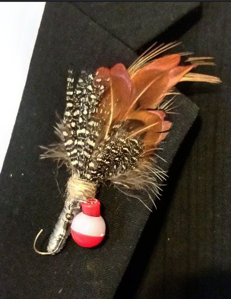 Fishing Boutonniere This listing is for 1 little Boutonniere that features Fancy Feathers, a Fishing Hook, Bubble and Spun with line. This cute and unique boutonniere is Perfect and crafted for the Fishing enthusiast. You can even put it on your hat as a decoration! Give him a Boutonniere that he will LOVE wearing. (The sharp part of the hook has been nipped off for safety ) Measures approx 8cm long (3 1/2in.) and 4cm wide (1 1/2in.) Each Bout is attached with a pin on the back for easy attachme Fishing Lure Boutonniere, Fishing Boutonniere, Unique Boutonniere, Fishing Themed Wedding, Boutonniere Wedding Rustic, Pearl Pins, Fishing Wedding, Madison Wedding, Corsage And Boutonniere