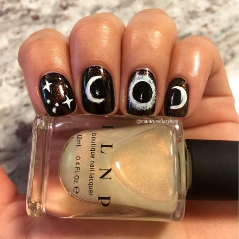 Solar eclipse nails using a black base with ILNP The Magician over top #manicurediary Solar Eclipse Nails Design, Eclipse Inspired Makeup, Solar Eclipse Inspired Nails, Eclipse Nail Ideas, Eclipse Nail Art, Eclipse Nails Design, Eclipse Nails 2024, Solar Eclipse Nail Art, Solar Eclipse Nails