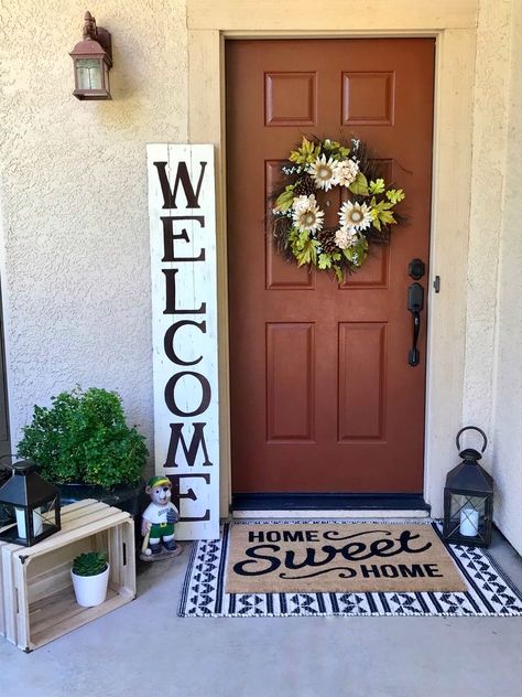 Front Door Simple Decor, Front Porch Ideas Brown Door, Small Condo Front Porch Ideas, Farmhouse Small Porch Ideas, Small Front Porch Decorating Modern, Front Door Welcome Sign Porch Ideas, Front Porch Decor With Laterns, Townhouse Porch Decor, Small Outdoor Entryway Decor